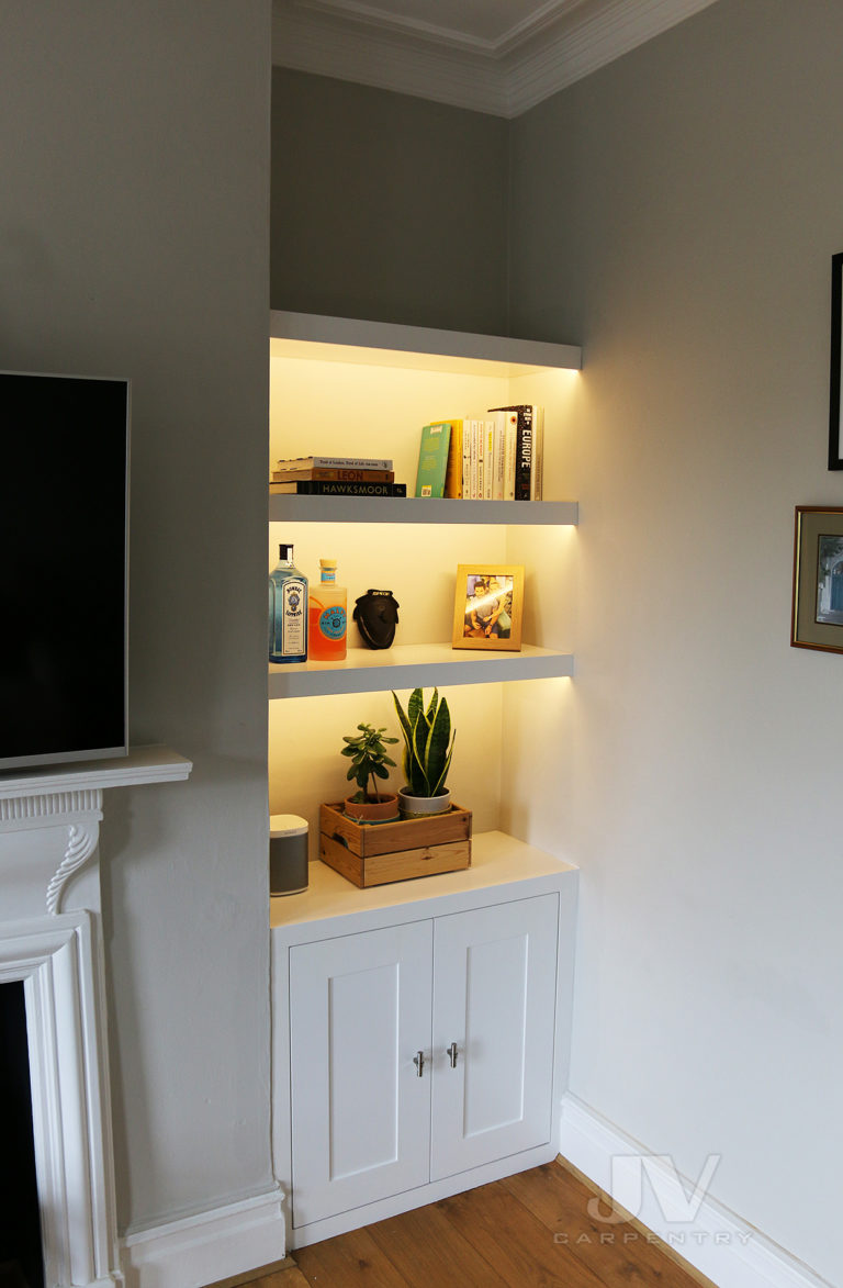 Alcove Shelves with Lights and Cabinets in the Living room | JV Carpentry