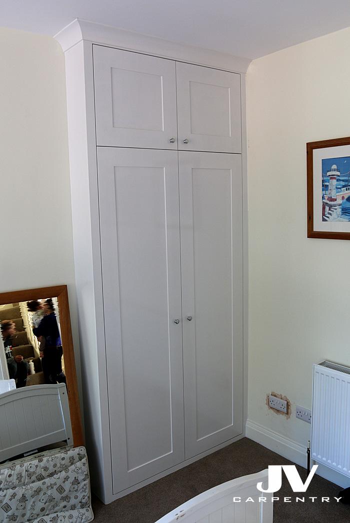 white bespoke alcove wardrobe